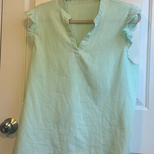 Green striped sleeveless shirt great office staple.